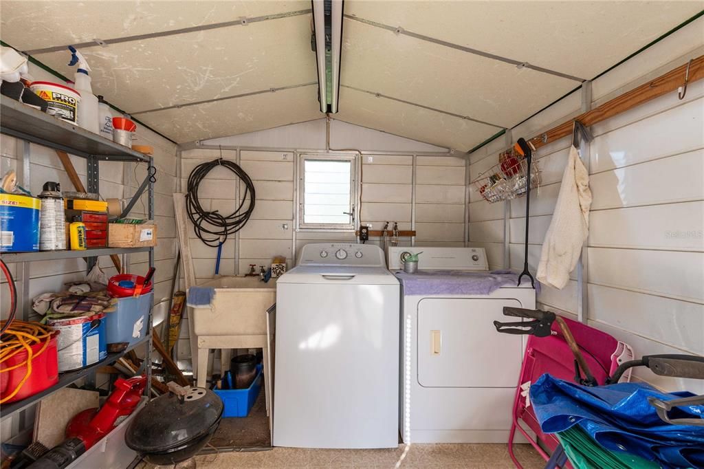 Laundry area is off the carport.