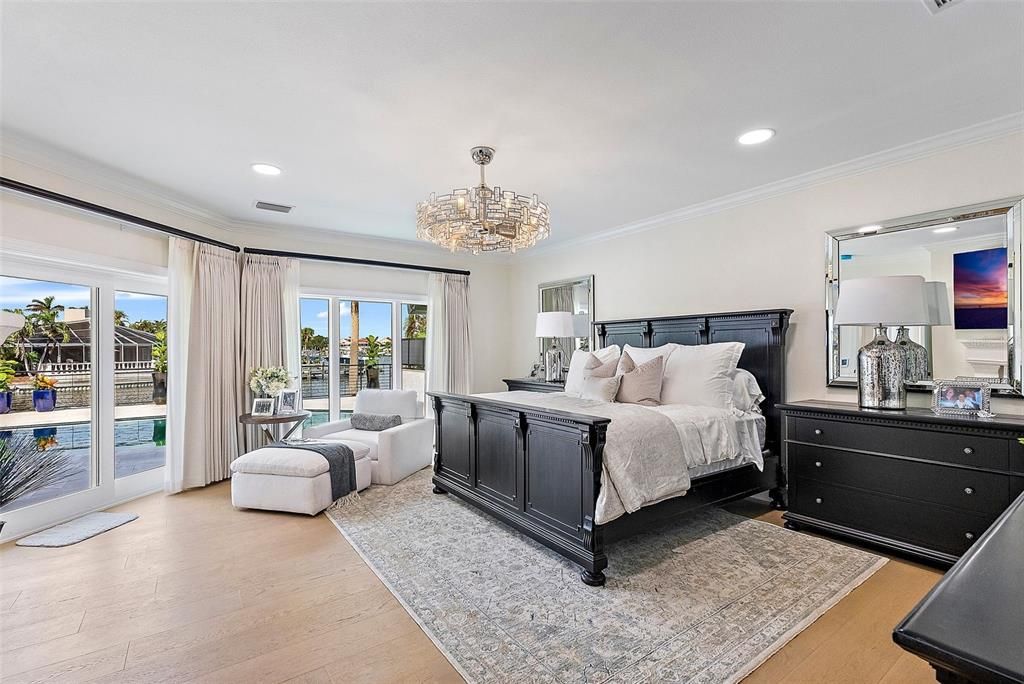 Primary Bedroom with pool & waterview