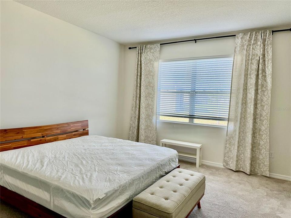 master bedroom with lake view