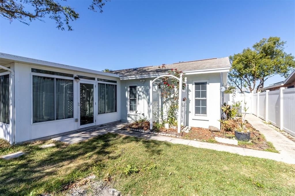 Backyard exiting from Florida room