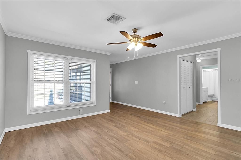 Living room facing entryway - side is to the 2nd bedroom, 2nd bath, utility room and garage