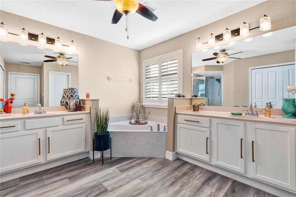 Primary ensuite with dual vanities.