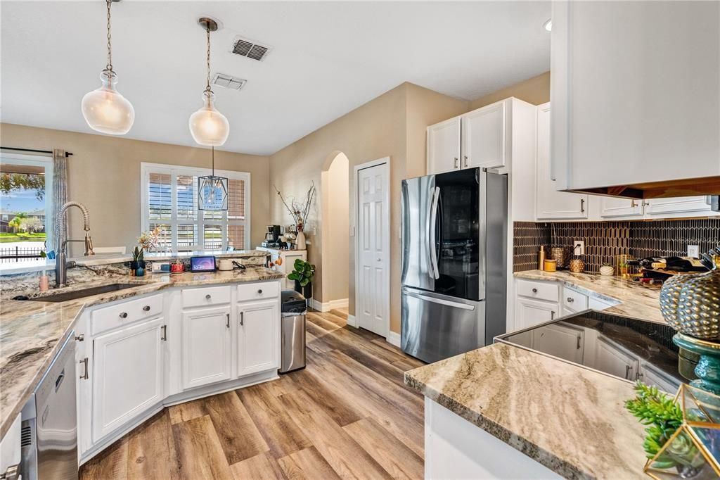 New granite, stainless steel appliances with a breakfast bar!