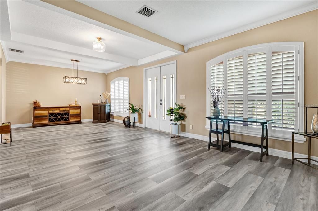 Wide open space, high ceilings, crown molding, plantation shutters -- just beautiful!