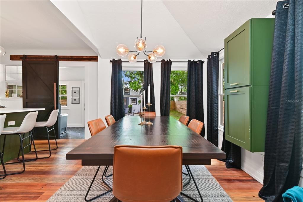 Additional storage behind dining table for food items or other items.