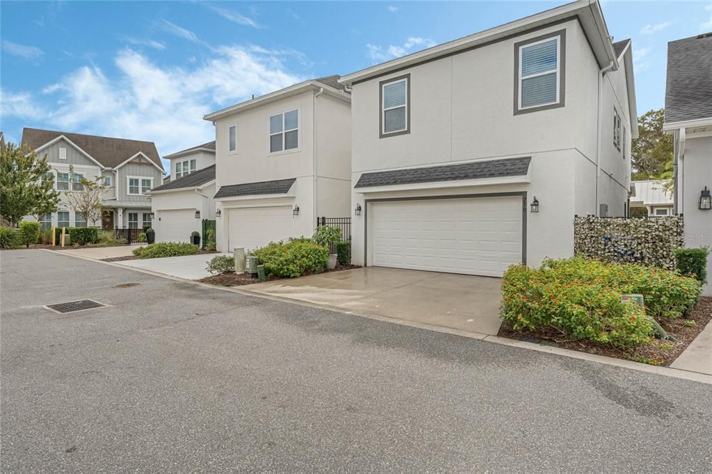 Rear Facade - Functioning Driveway, Garage and Alley