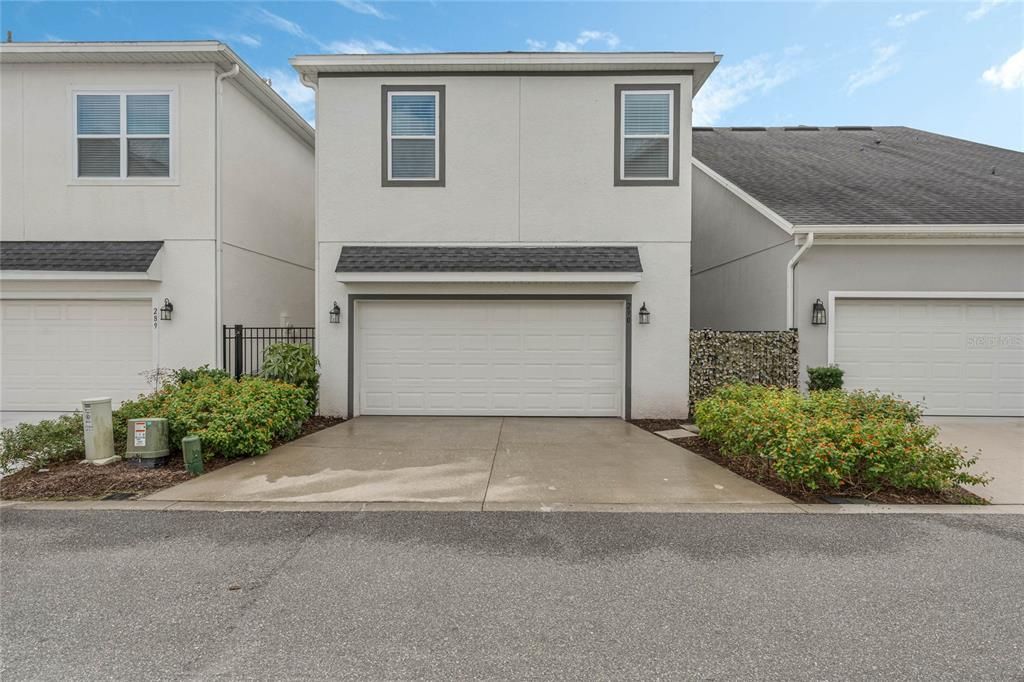 Rear Facade - Functioning Driveway, Garage and Alley