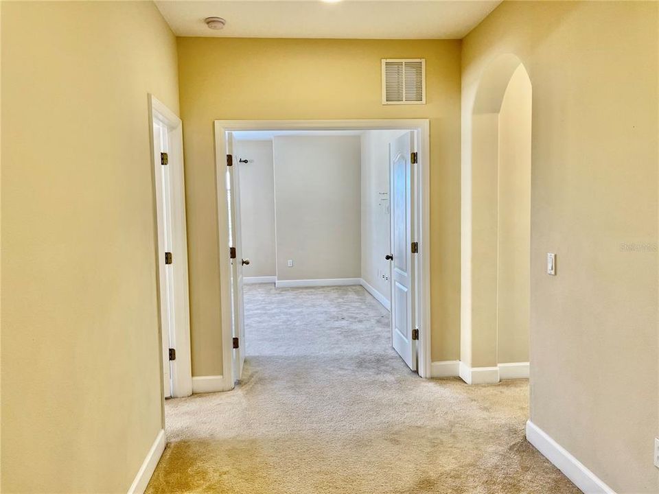 hallway leading to entertainment room