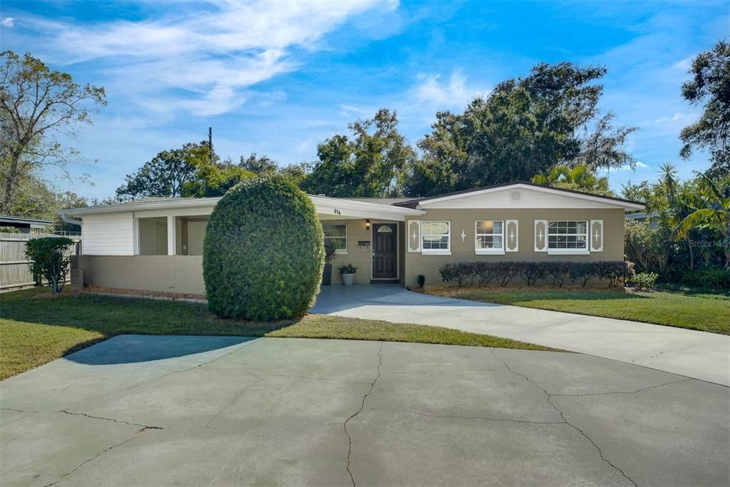 Front Exterior - long driveway and parking pad