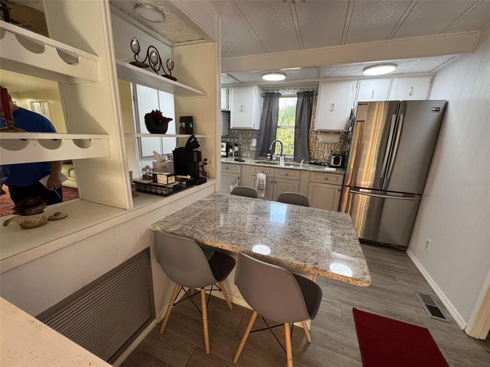 Kitchen with built in granite table