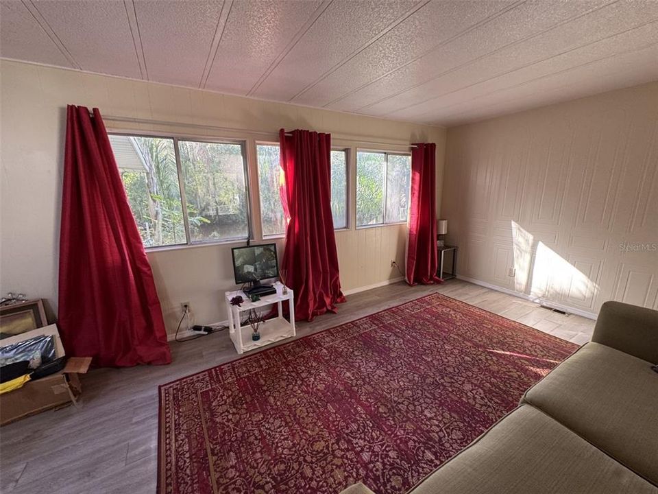 Living room with view of creek