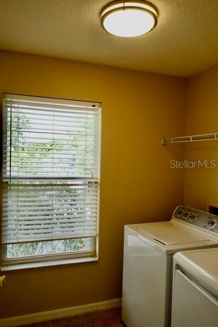 inside utility room/updated lighting and blinds