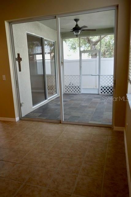 Dinette area w/Sliding doors from kitchen to covered patio