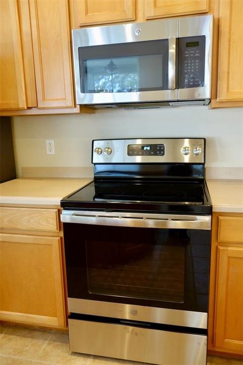 Brand new GE SS stove & newer GE Profile Microwave