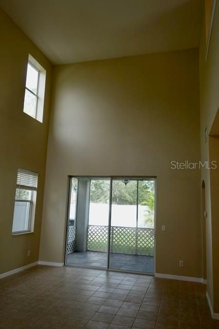 Great Room w/ sliders leading to covered lanai