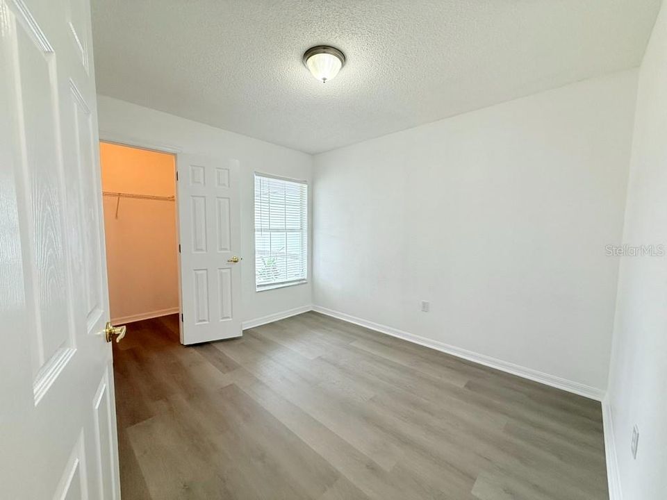 Second bedroom layout with walk-in closet.