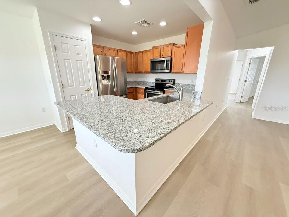 Remodeled Kitchen, stainless steel appliances and granite counter-tops.