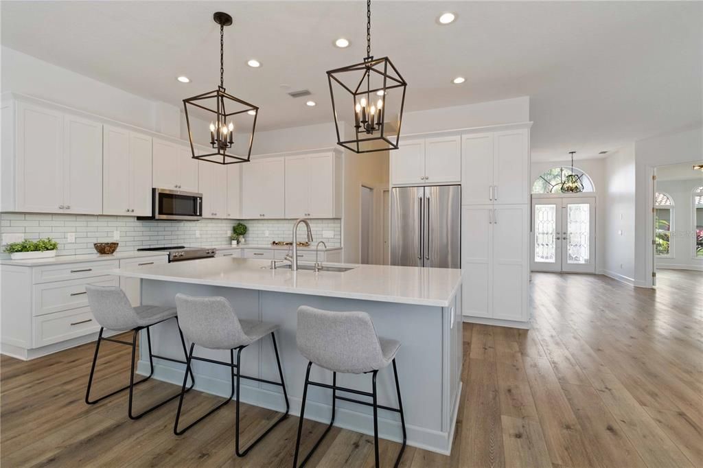 Spacious kitchen with center island/countertop bar