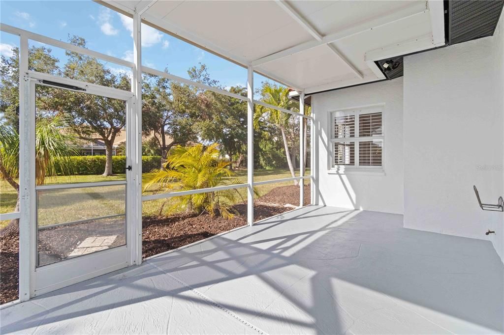 Additional covered area on lanai with view of rear yard