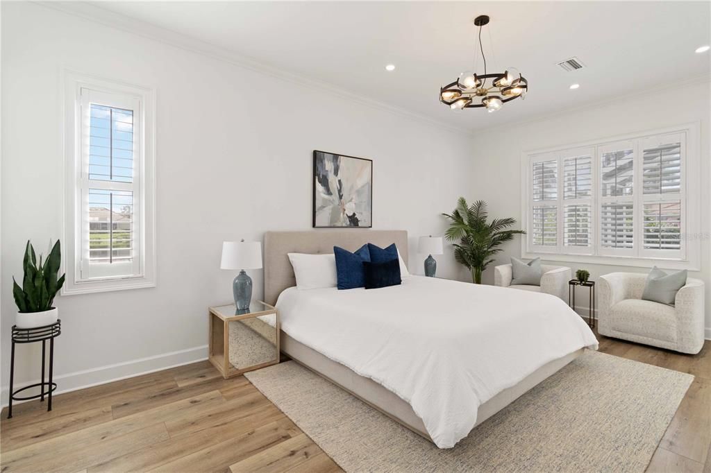 Master bedroom has ample space for a seating area