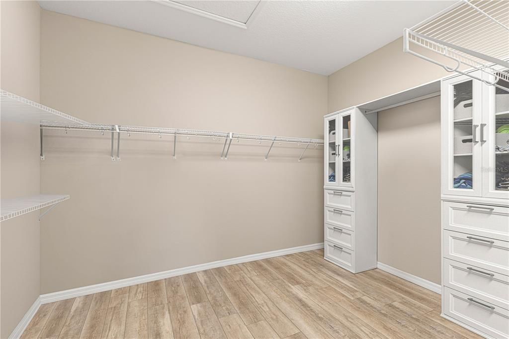 Primary large walk-in closet 9'-9'6.