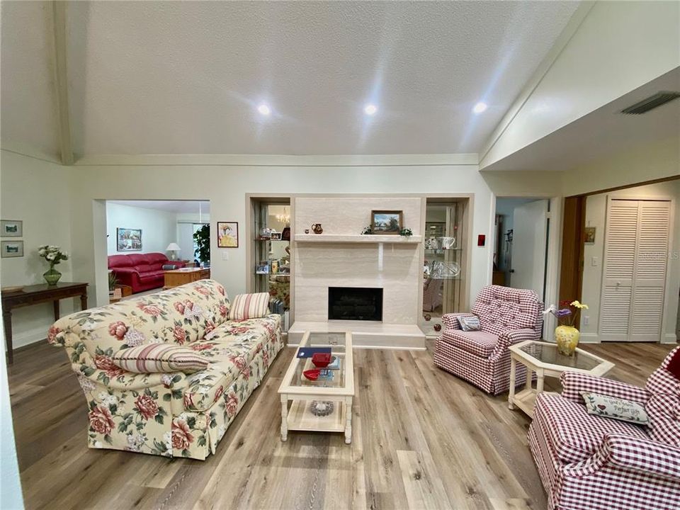 Living Room w travertine faced fireplace