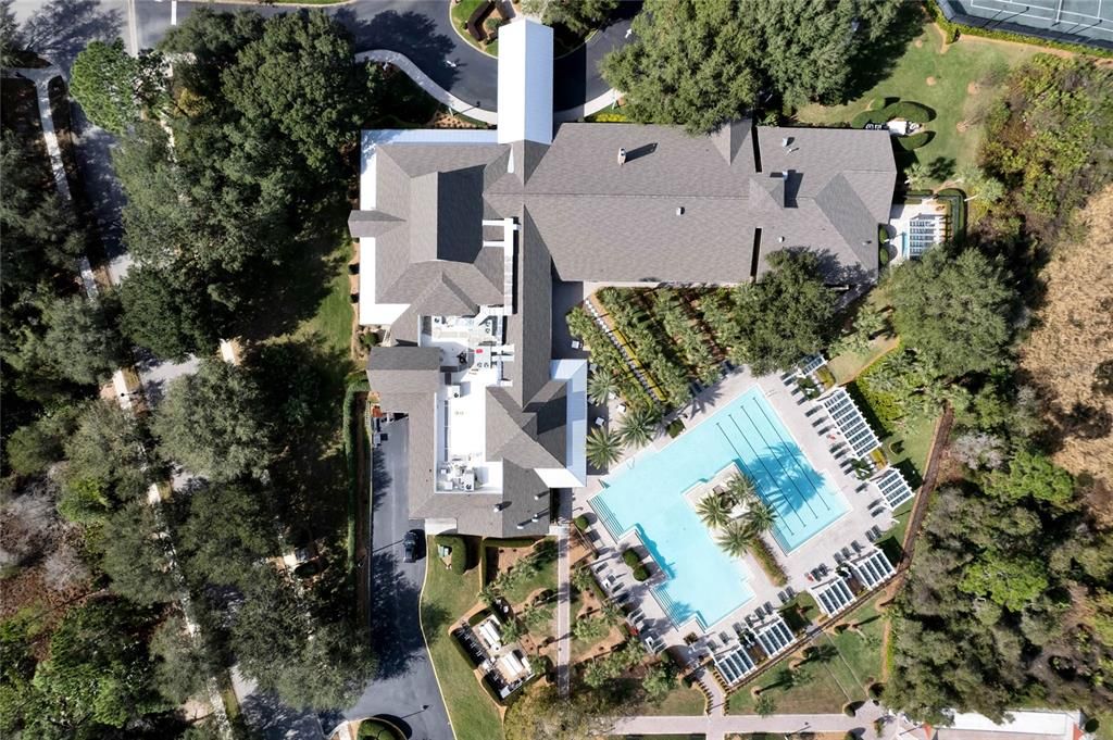 Aerial view above the Victoria Gardens clubhouse & resort style heated pool