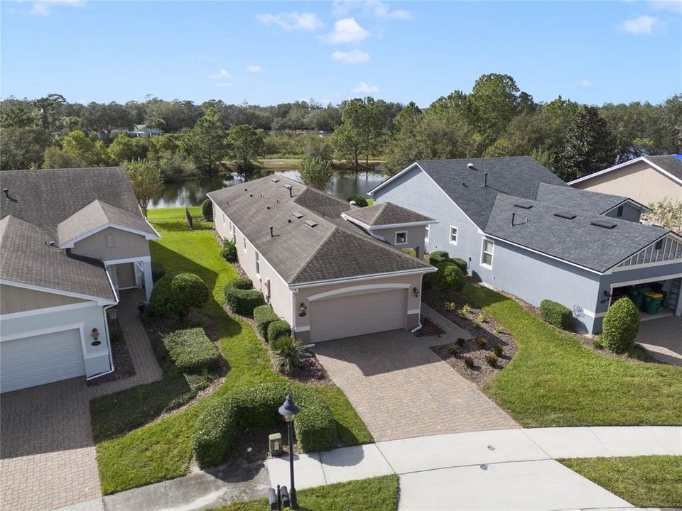 Aerial front view of home w/ Pond & conservation area view