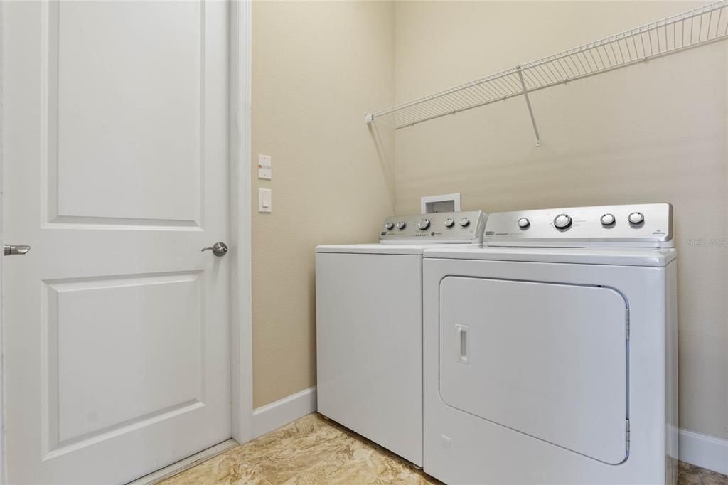 7' x 6'6" Utility Room w/ natural gas & electric connection for dryer