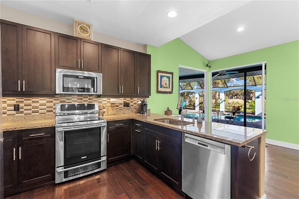 Kitchen with hardwood cabinetry, can be painted