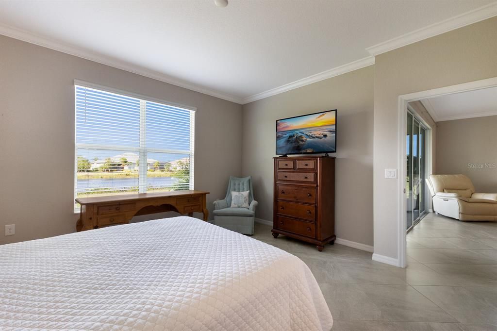 PRIMARY BEDROOM WITH WATER VIEW