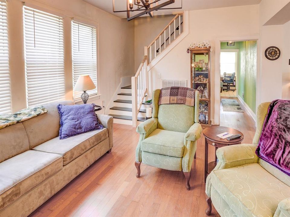 Living room with real wood floors.