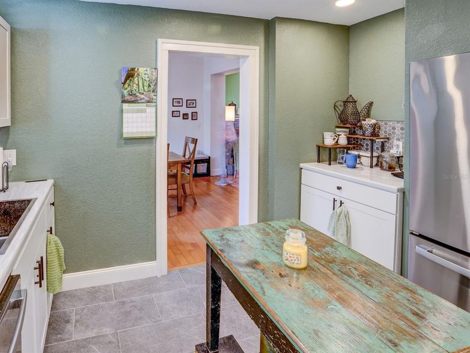 Kitchen with view of the dining room.