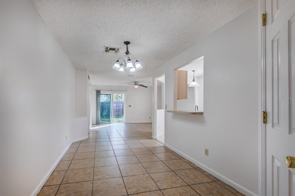 Looking from hallway to back of the home.