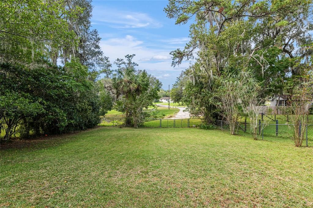 Large fenced backyard.