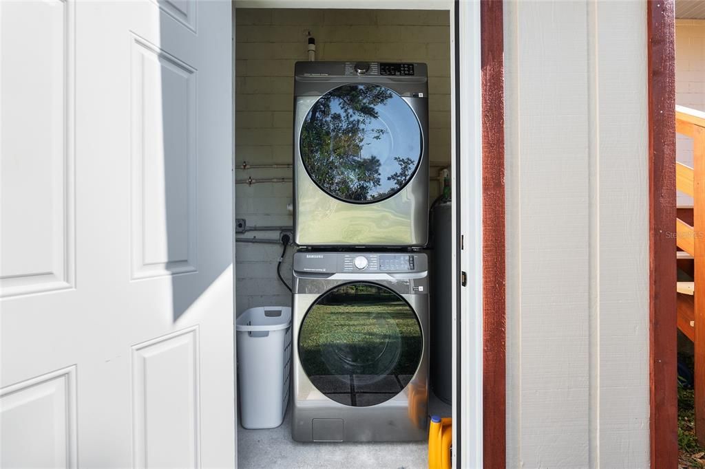 Laundry with a new washer and dryer set.