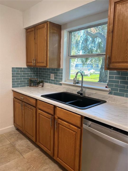 Kitchen w/ view outside