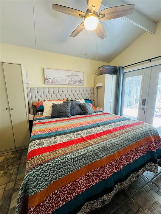 King Size Bed with doors to outside