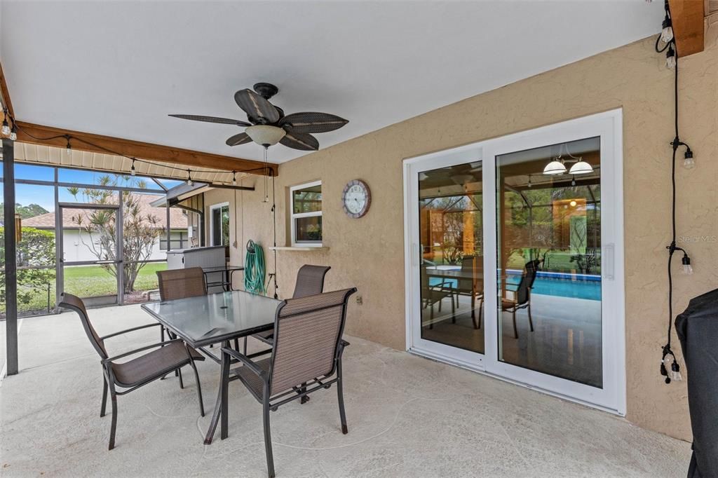 covered patio within the screened pool cage