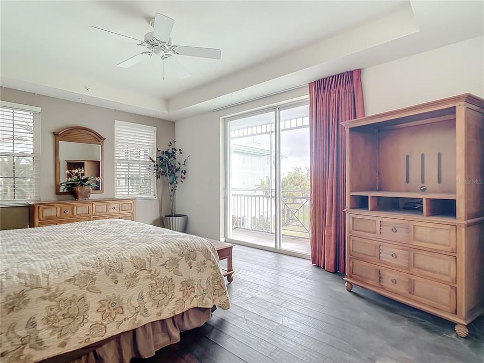 Primary Bedroom with private screened balcony