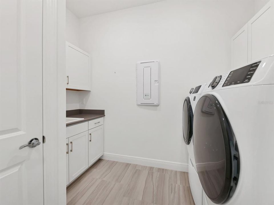 Laundry room with Sink and added upper and lower cabinets