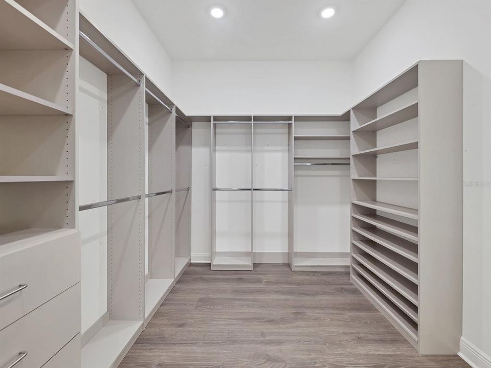 Primary bedroom seller added custom closet shelving