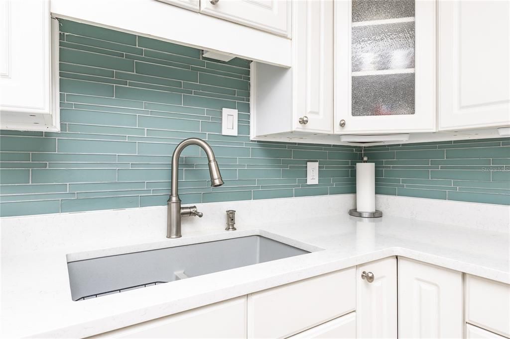 Nice deep sink and backsplash