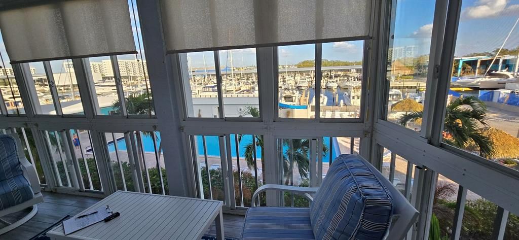 Florida room & view of pool/ Maximo Marina.