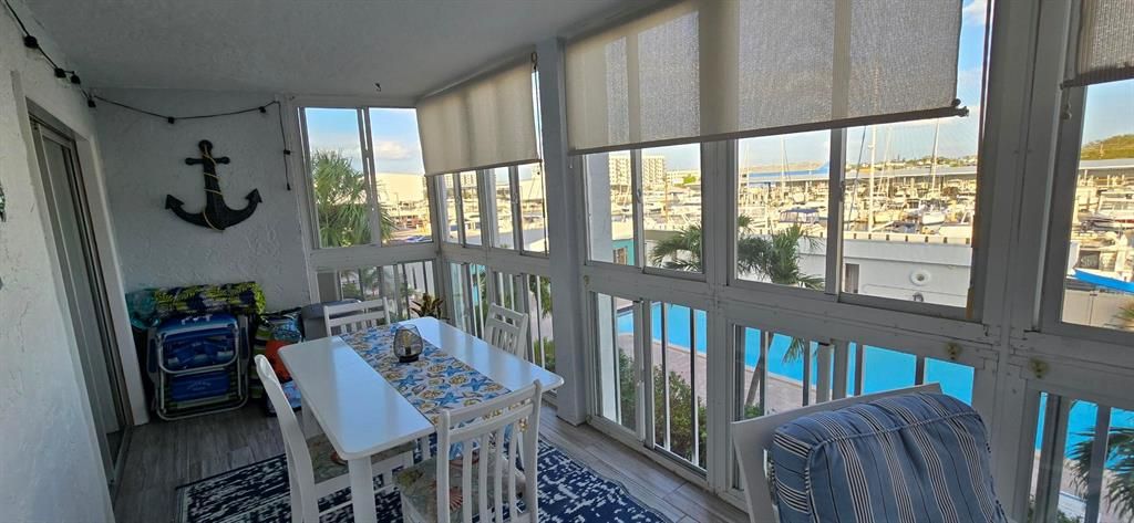 Florida room & view of pool/ Maximo Marina.