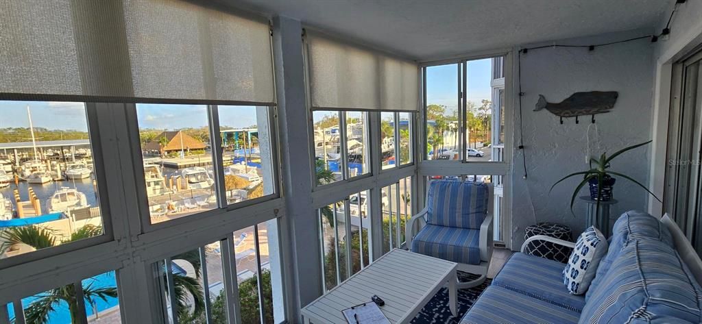 Florida room & view of pool/ Maximo Marina.