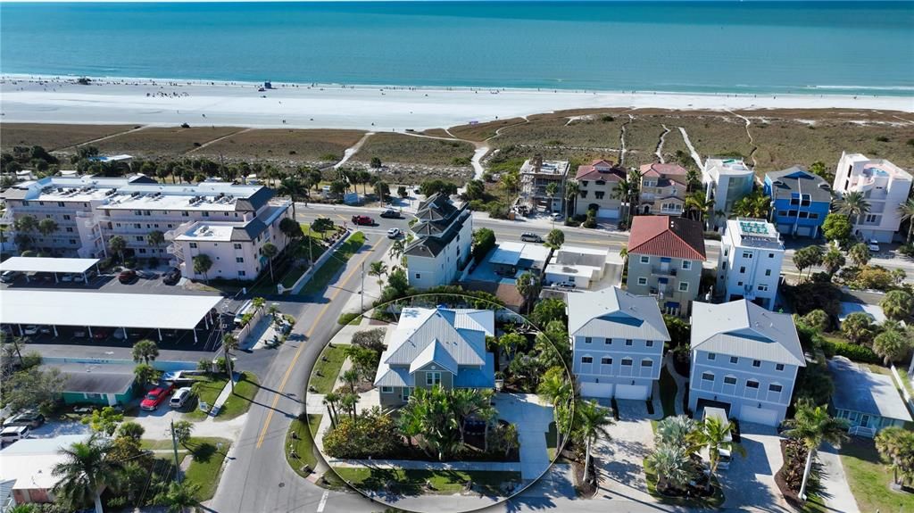 Areal of both duplexes and distance to the public beach