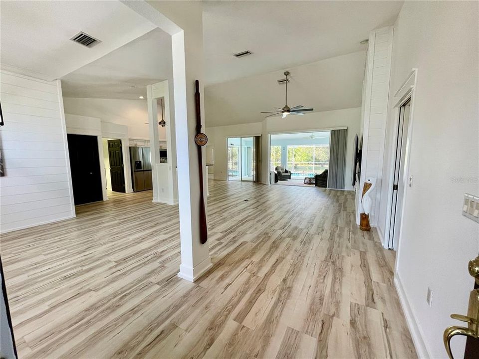 Living area has high ceilings. LVP through most of the home.