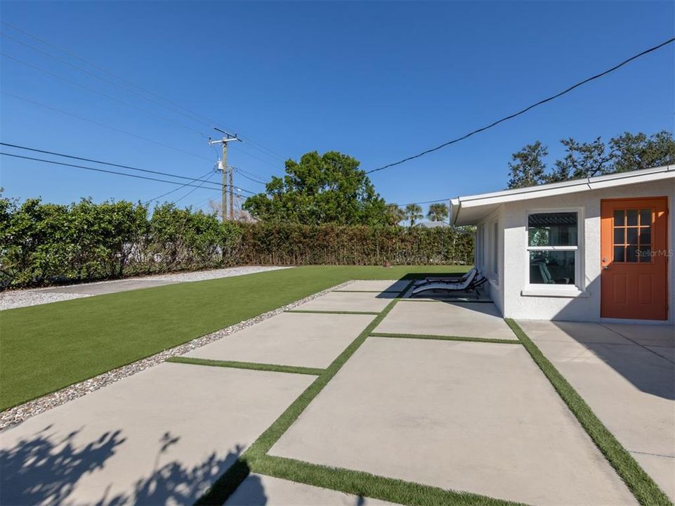 Back patio is large enough for outdoor activities.