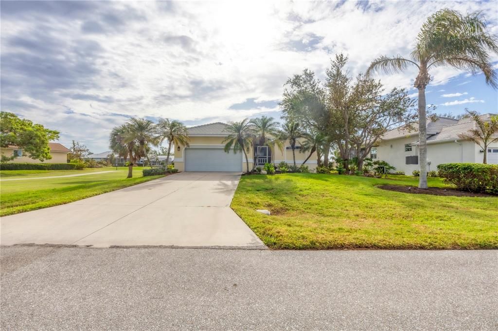 Oversized lot with golf cart path on L making it a little more private